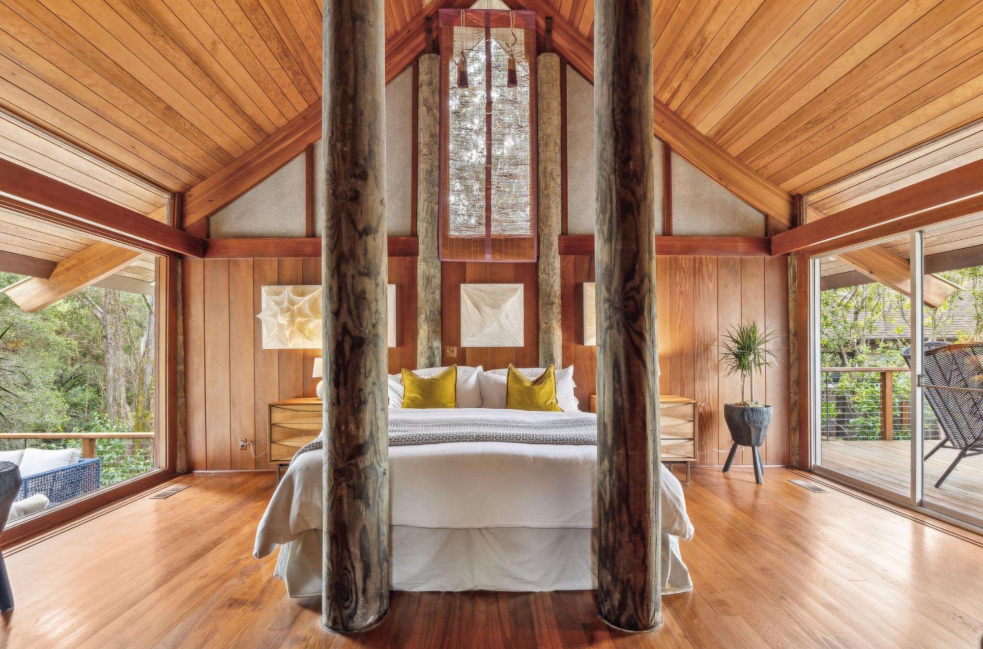 293 Elysian Fields Drive — Primary bedroom with vaulted ceiling and natural log posts
